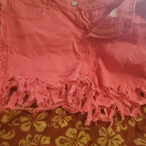 Pink cut up shorts
